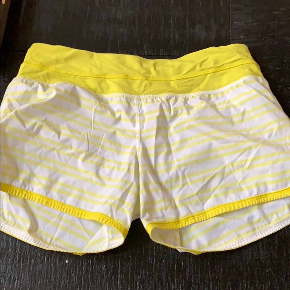 Yellow & White Lululemon Size 8 running sh…